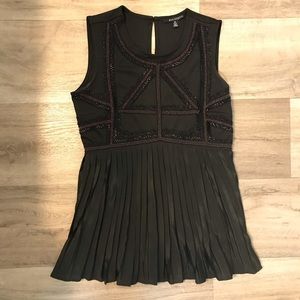 Eva Longoria peplum tank blouse beaded pleated